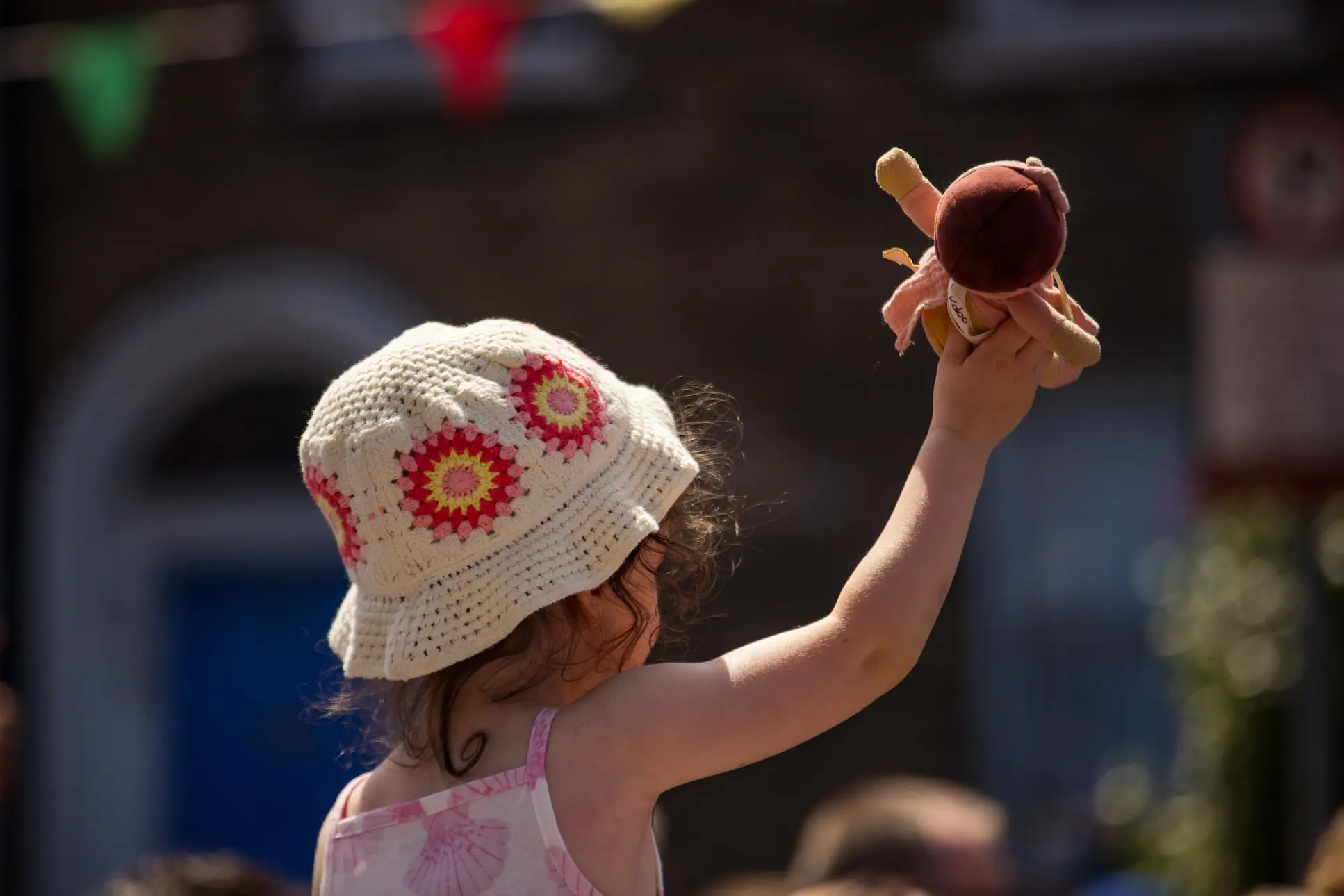A child playing with a toy aeroplane